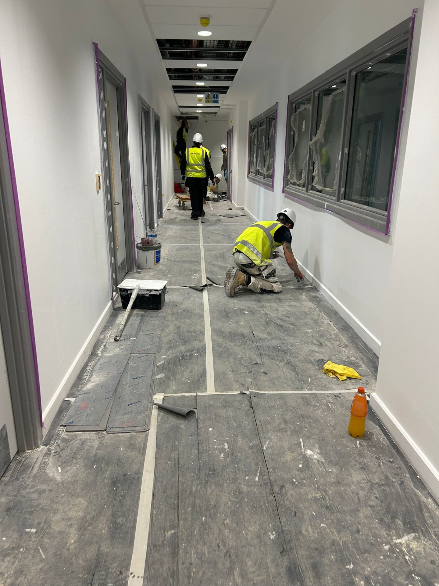 Whitechapel clinic corridor repaint in progress